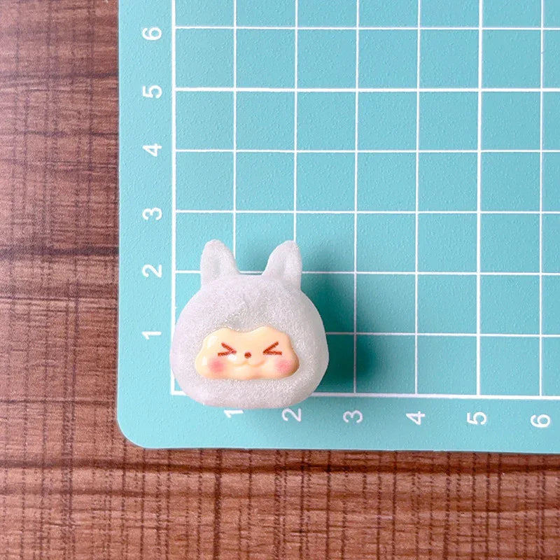 Through-hole luminous flocking kiki rabbit head