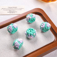 green beads green cream purple bow