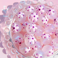 Pink flowers and purple dots