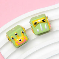 Three eyes green beads
