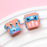 Three eyes orange beads