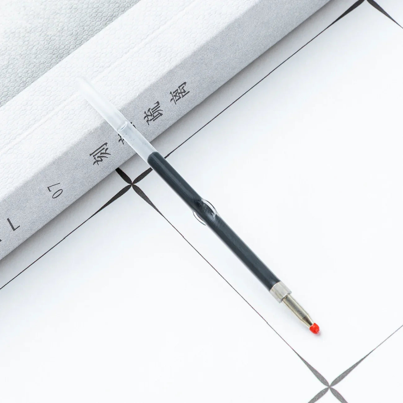Ballpoint pen replacement core