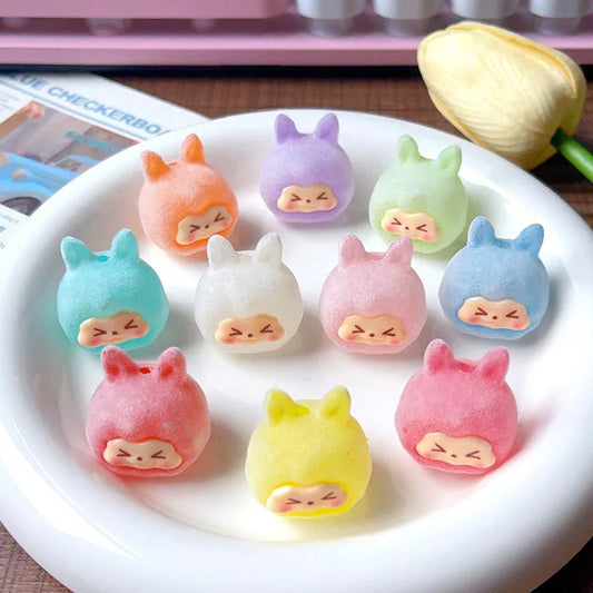 Through-hole luminous flocking kiki rabbit head