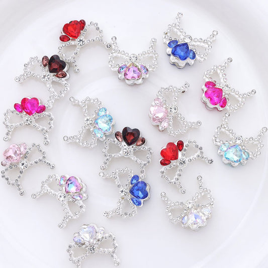 Alloy Bow Crown with Straight-hole Beads Featuring Colorful Heart-shaped Diamonds and Small Rhinestones.