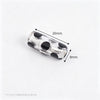 Silver foil black dot cylinder