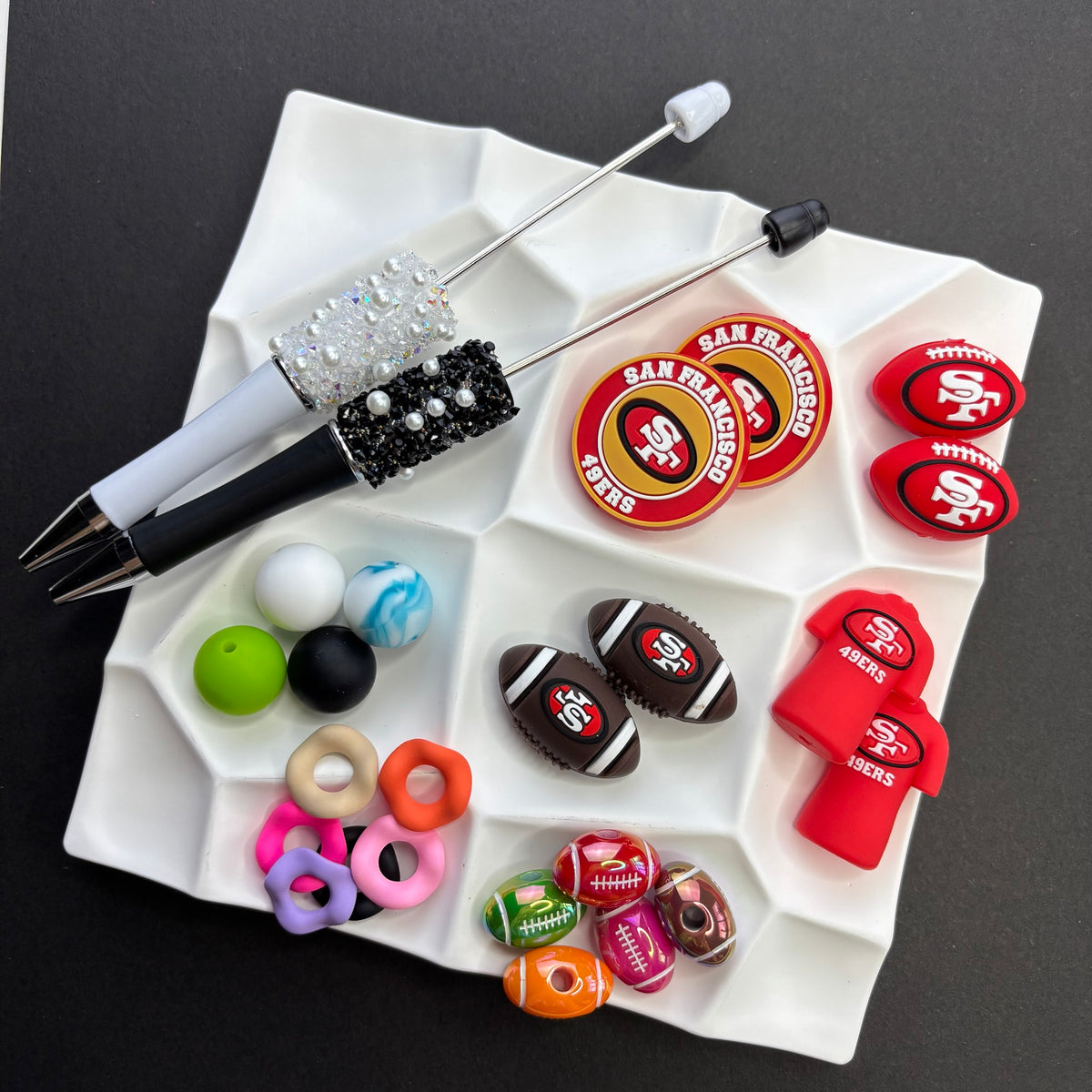 NFL Team Silicone Bead Set –NFL Team Combo Packs | DIY Sports Fan Bracelet & Keychain Craft Bead
